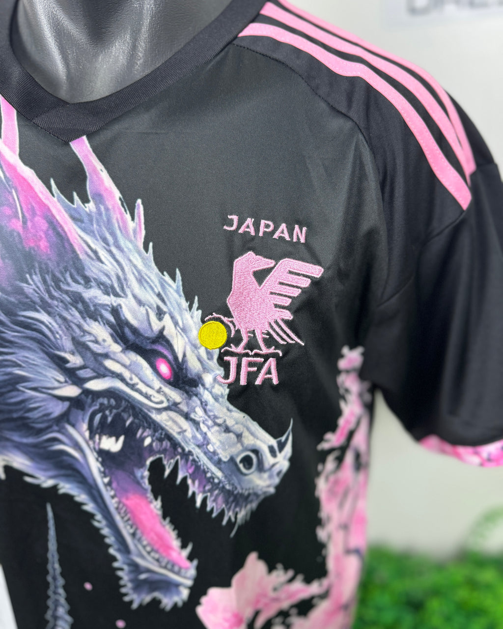 Black sports jersey with dragon design and 'Japan JFA' logo